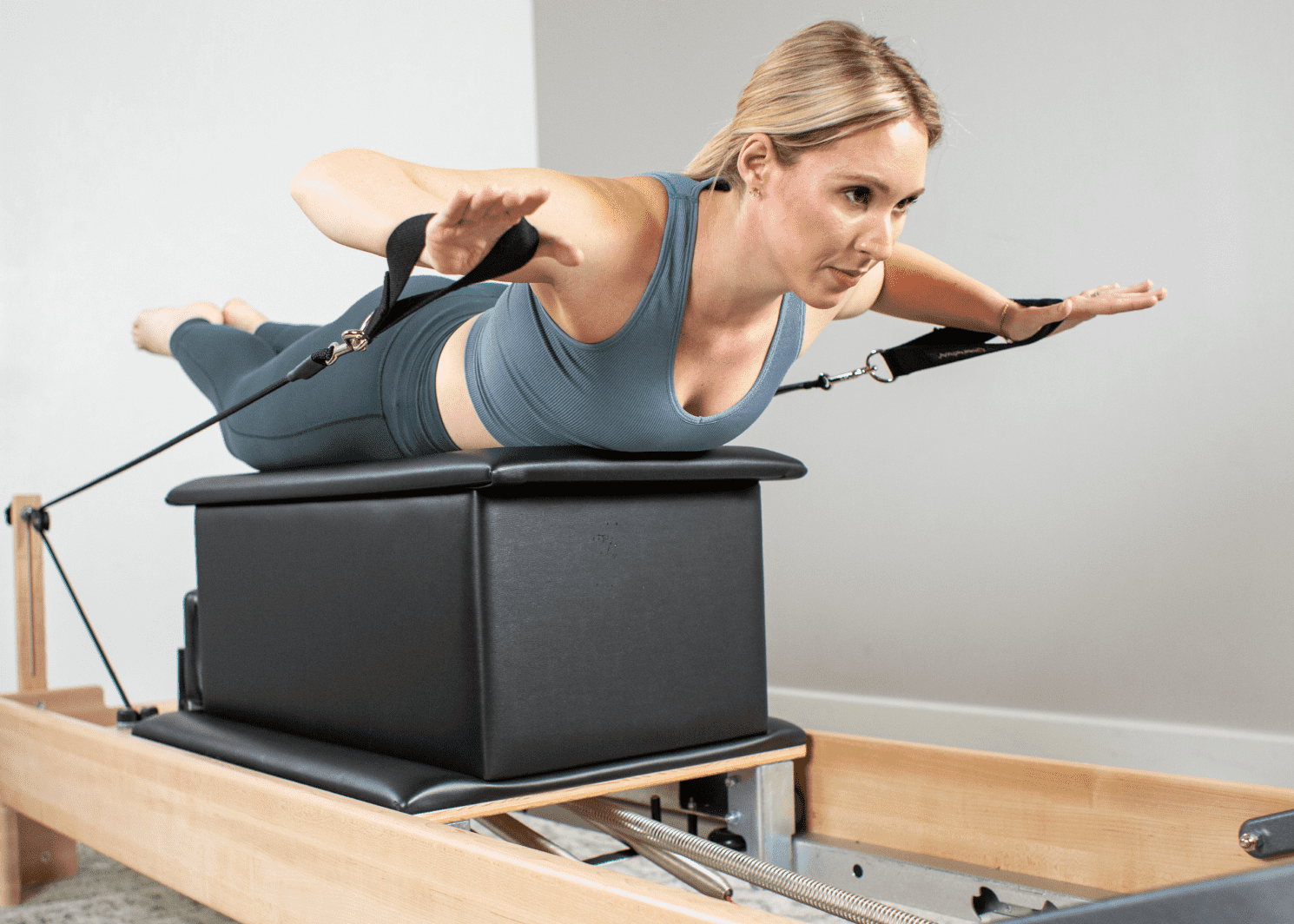 woman on stomach on sitting box