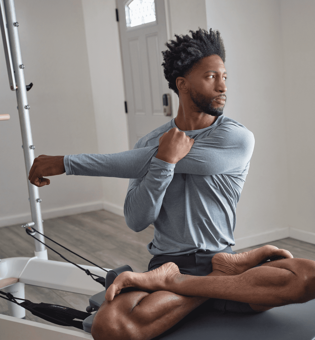 man stretching arms