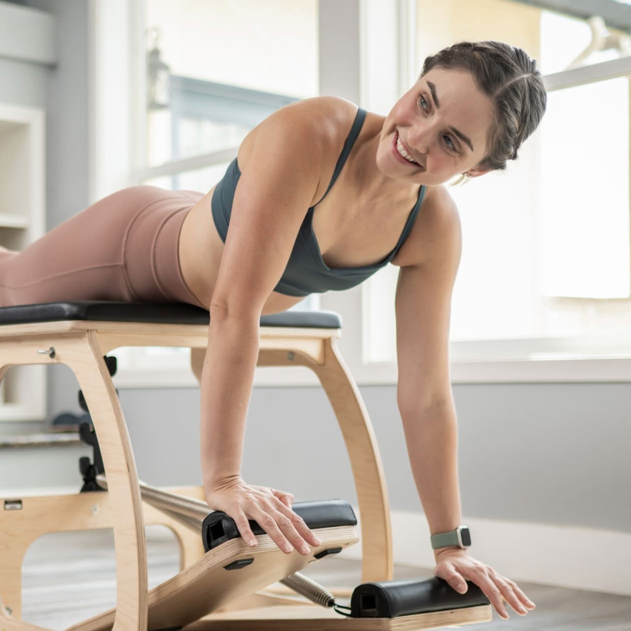 woman on pilates exo chair