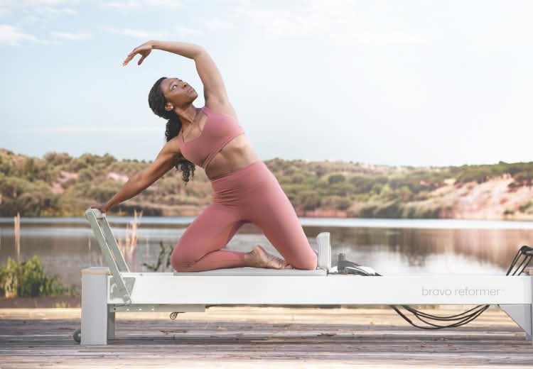 woman on bravo reformer