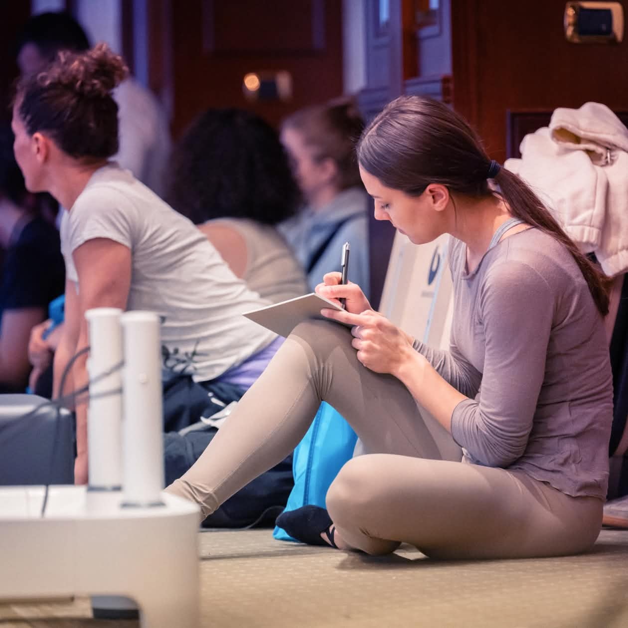 people in pilates workshop